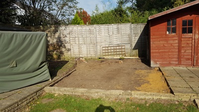 Area for future patio cleared, although existing shed will require moving