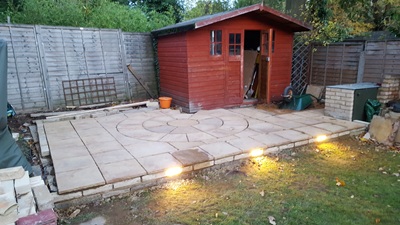 Most slabs now laid, but current location of shed is preventing completion