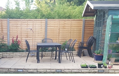 Completed patio, with dining table in place - rear fence also renewed