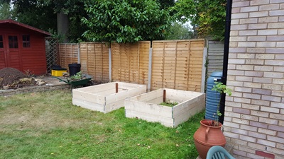 Assembled beds placed in position on grass