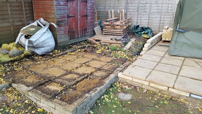 Prior patio slabs removed to prepare area