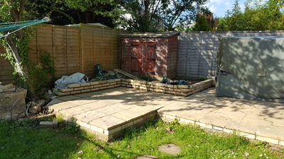 Slabs laid, and backing wall (for raised bed) completed