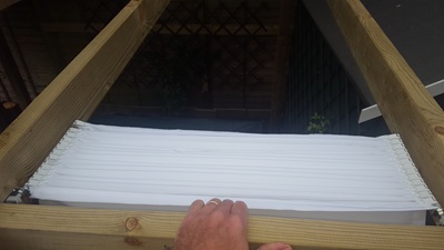 Retractable sun-shade being installed